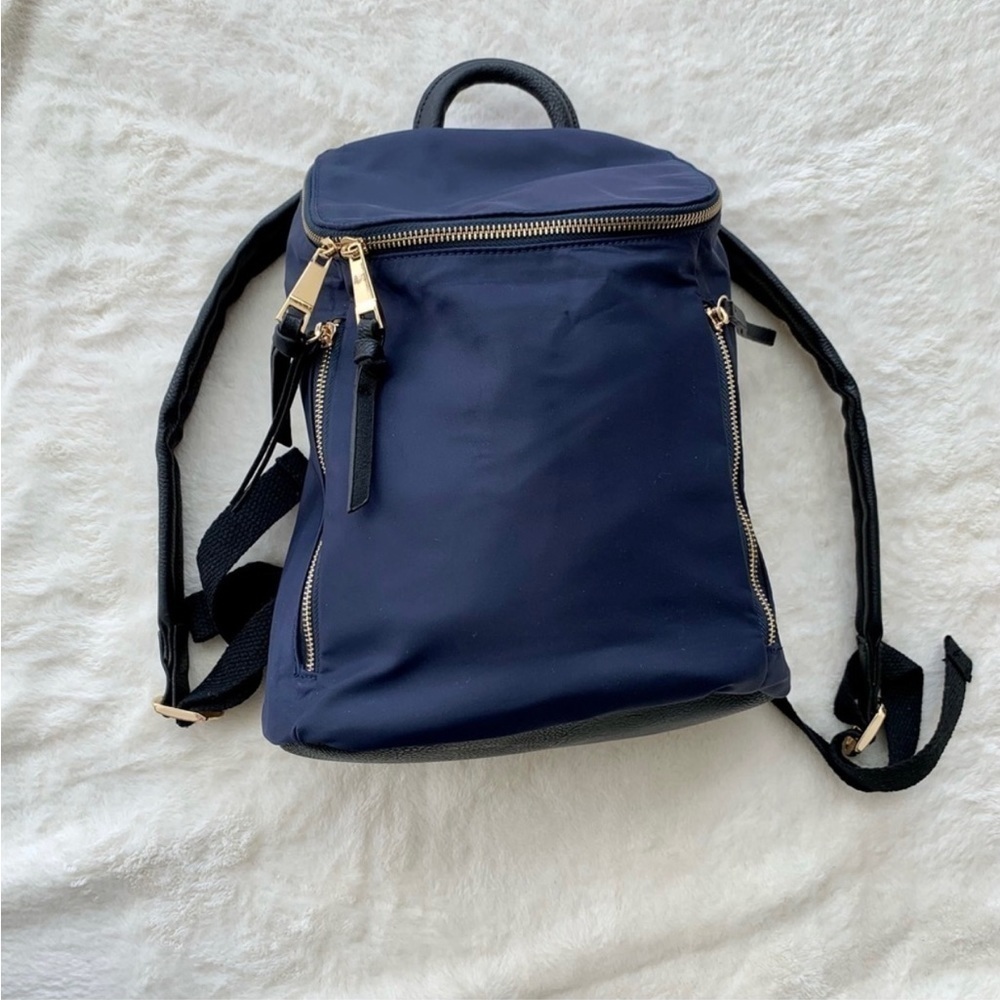 Bizou mini backpack blue black New with tags
Travel daypack